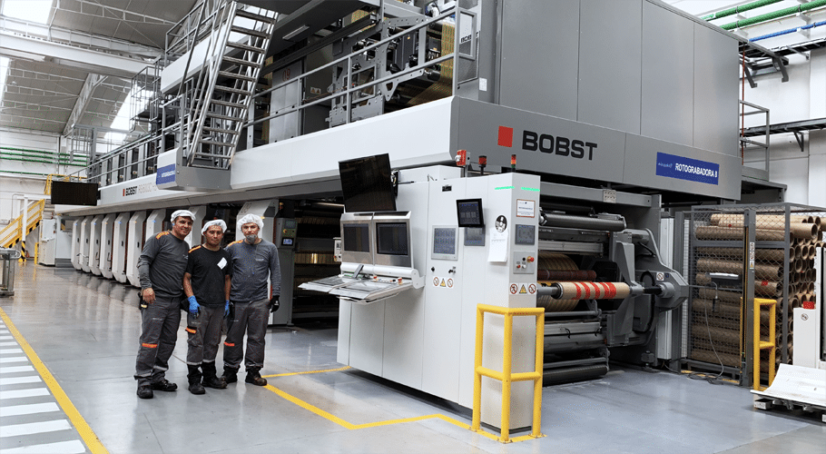 Minipak’s press operators in front of the Bobst gravure press